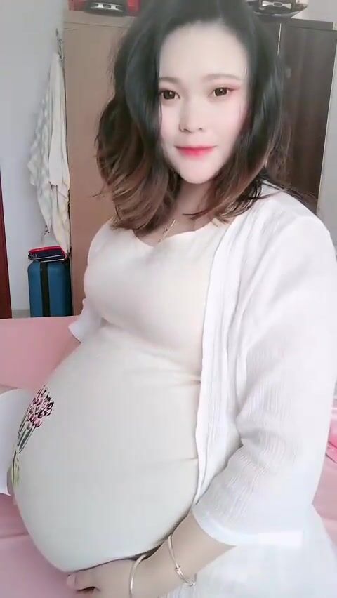 Chinese mom big pregnant belly