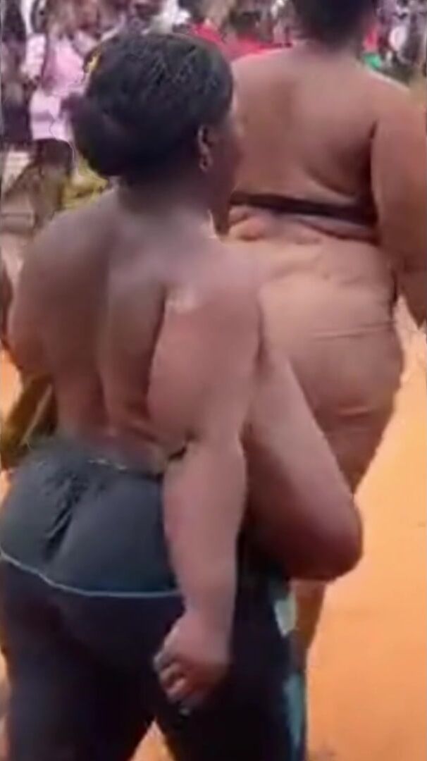 Enormous African Breasts just walking around