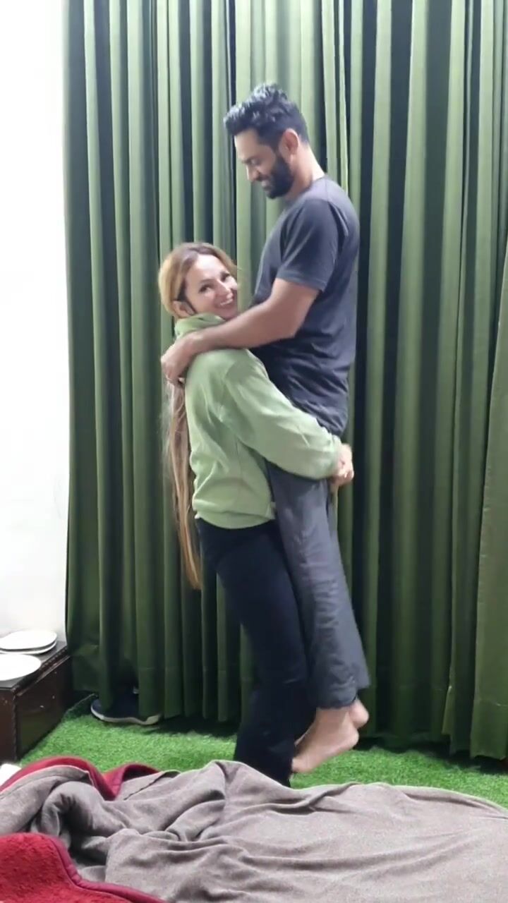 Wife lifting husband