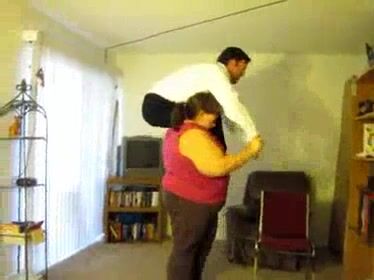 Old woman lift carry man