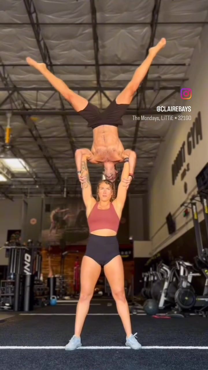 Strong girl acrobat lift