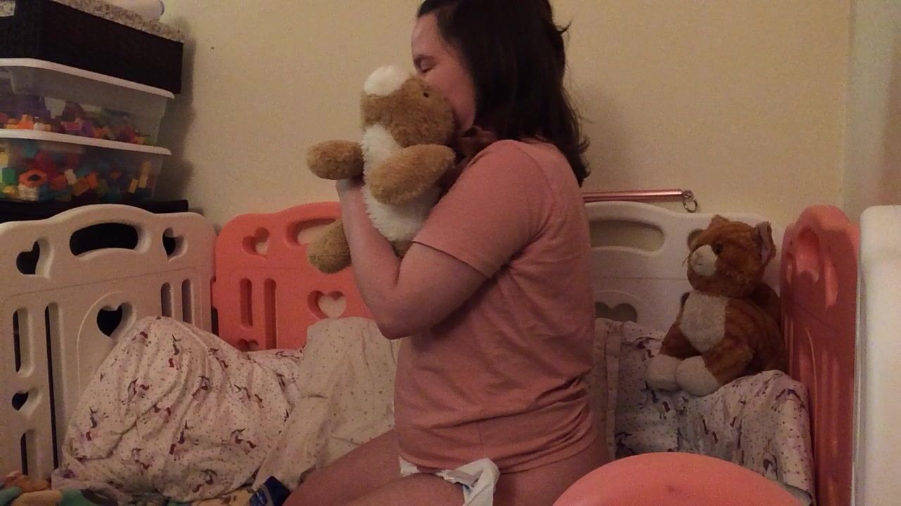 Unknown girl makes enema in nappy